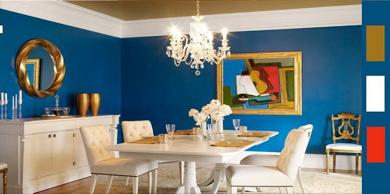 Comedor blanco, paredes azules, adornos dorados